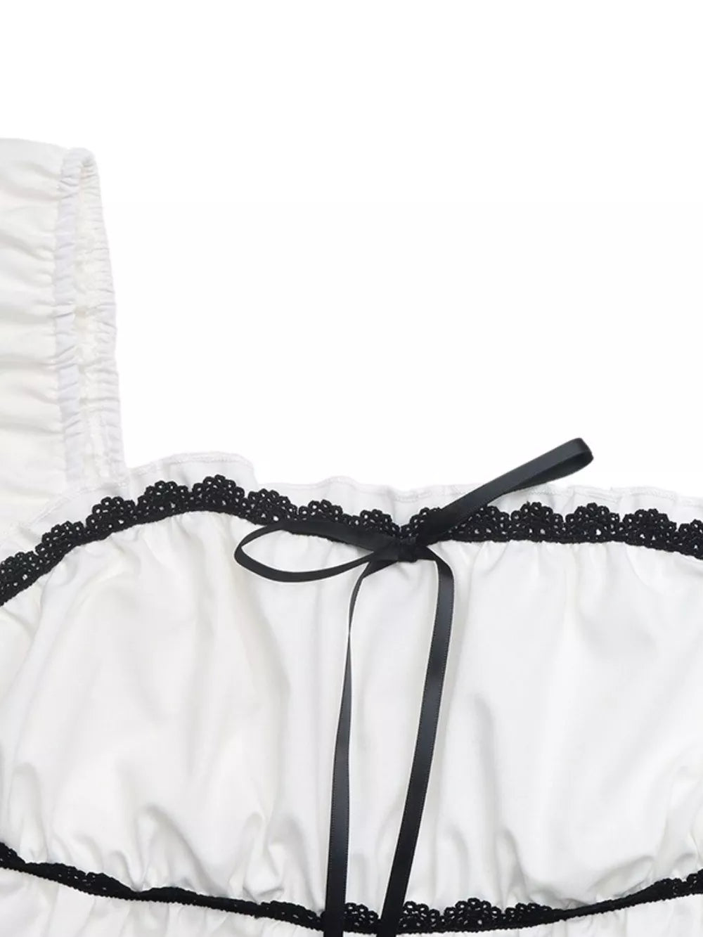 White maternity blouse with black lace trim and black bowknot detail