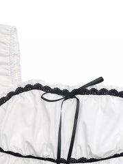 White maternity blouse with black lace trim and black bowknot detail