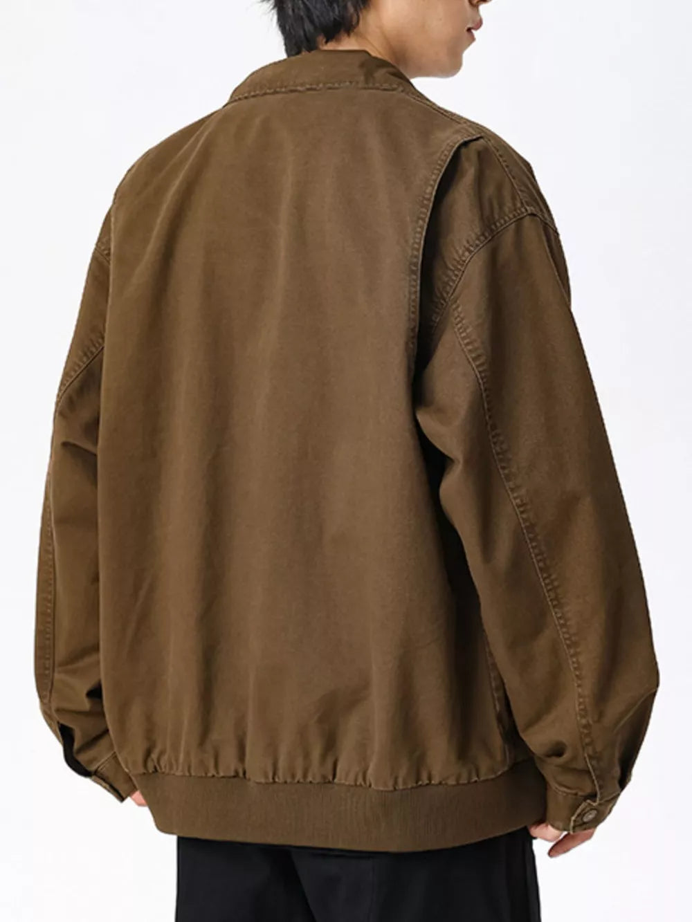 Men's brown cotton zip-up jacket with elasticated cuffs and hem.
