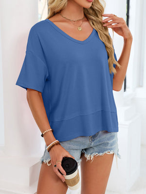 Blue relaxed fit V-neck t-shirt with short sleeves and a layered hem detail.