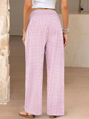 Pink plaid gingham maternity pants with smocked waistband and wide legs.