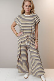 Rainbow stripe culotte jumpsuit with drawstring waist and side slits, cotton.