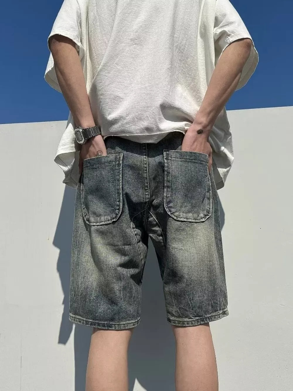 Men's Full Size Distressed Denim Shorts in Light, close-up detail