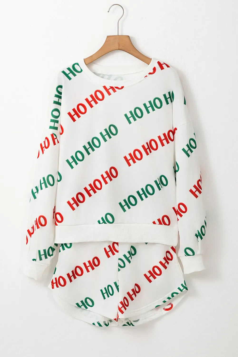 White loungewear set with allover red and green HO HO HO print.