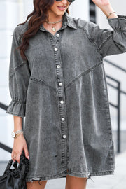 Gray denim shirtdress with button front and ruffled cuff detail.