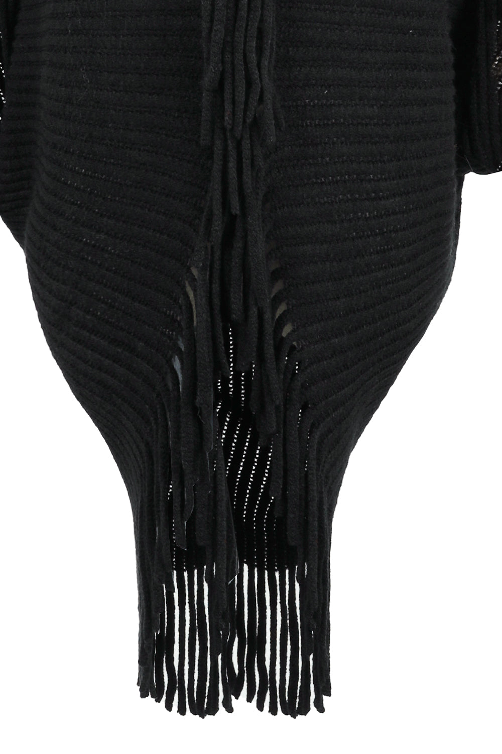 Black knit cape with fringe detail and open knit pattern.
