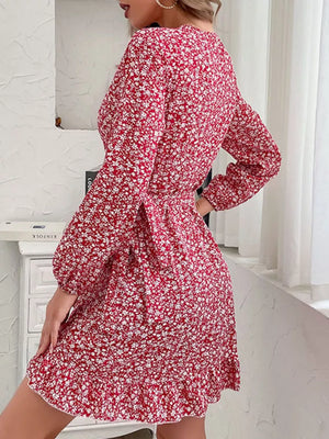 Red floral wrap mini dress with long sleeves and ruffled hem