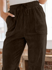 Chocolate corduroy drawstring tapered trousers with pockets