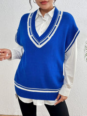 Blue acrylic knit vest with varsity stripes and pearl trim details.
