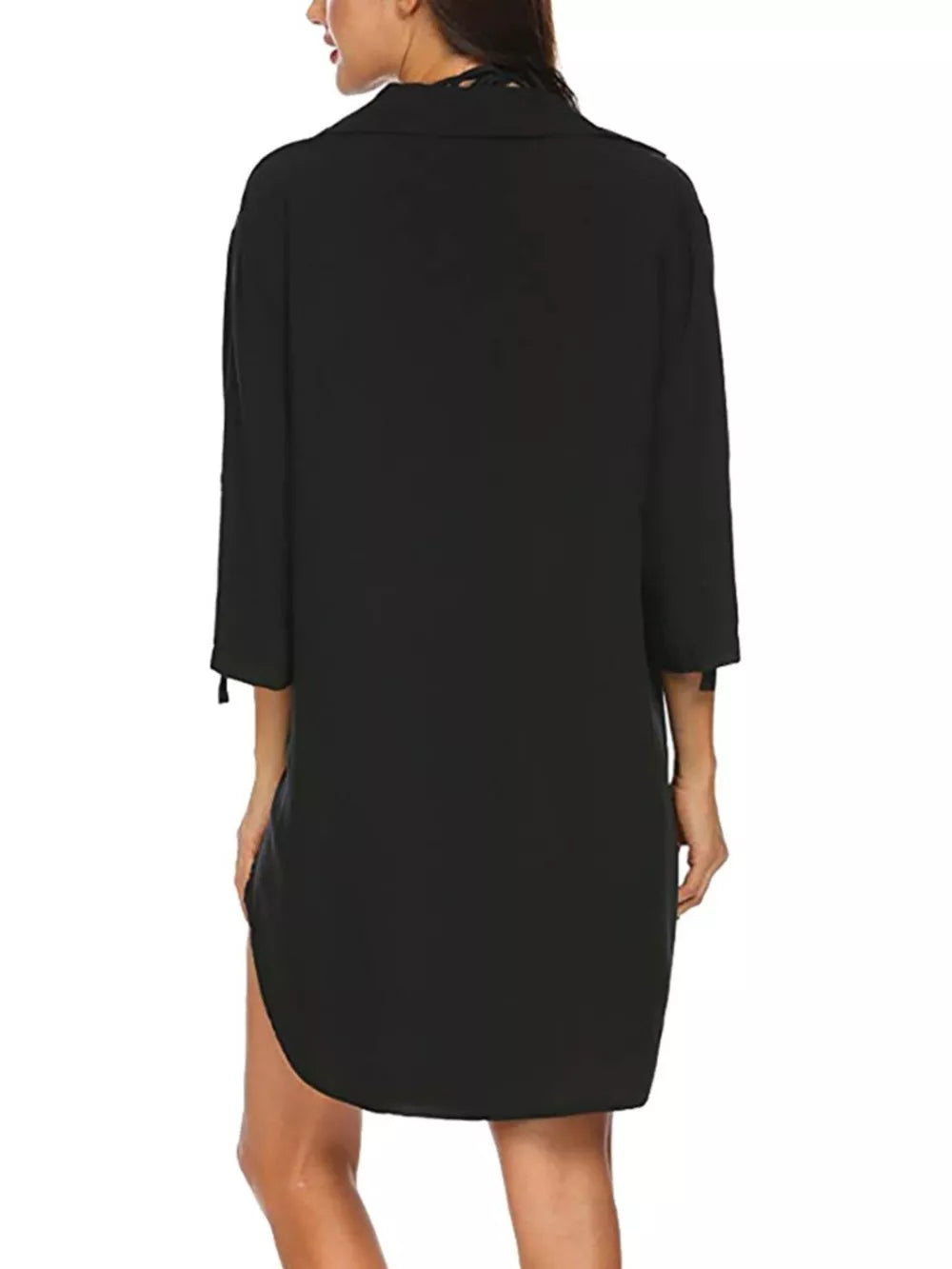 Black oversized collared shirt with 3/4 sleeves and side slits, polyester.