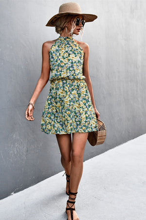 Yellow green floral halter neck mini dress with smocked waist