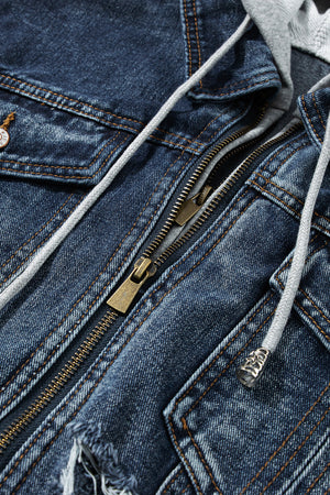 Dark blue denim jacket with grey hooded layer, zipper and drawstring details.