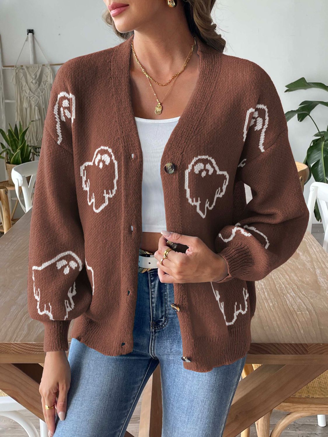 Brown balloon sleeve cardigan with white ghost motif and buttons