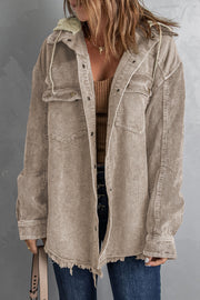Tan corduroy hooded utility jacket with frayed hem and chest pockets.