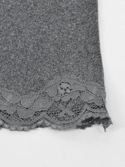 Grey bodycon mini dress with lace trim hem detail