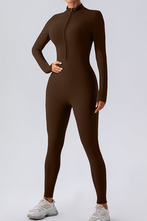 Chocolate zip-front bodycon jumpsuit with long sleeves and mock neck.