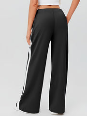 Black palazzo trousers with white side stripe detail