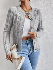 Gray cable-knit button-front cardigan with crew neck and textured sleeves.