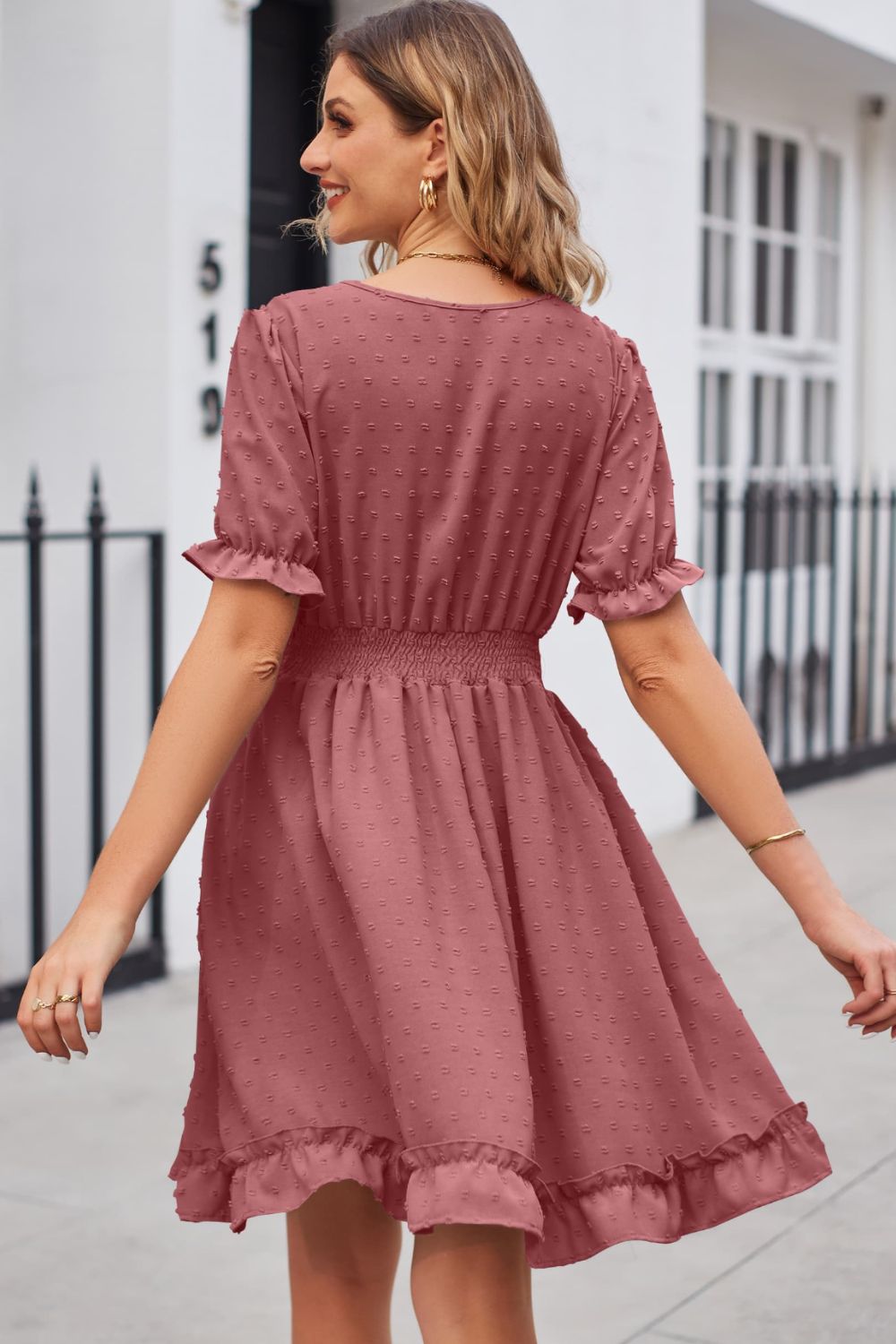 Dusty Pink textured dot puff sleeve fit-and-flare dress with smocked waist and ruffled hem.