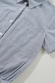 Pinstripe romper with shirred waist and chest pockets.
