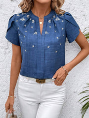 Blue embroidered floral keyhole blouse with short sleeves and a relaxed fit.