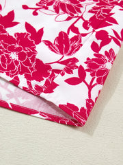 White polyester blouse with bold pink floral print and lace detail.