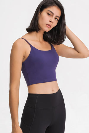 Purple scoop neck crop tank top with spaghetti straps, a basic style for athletic or casual wear.
