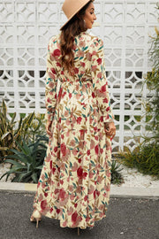 Floral ruffle maxi dress with tiered skirt in Floral, featuring a high neckline and long sleeves.