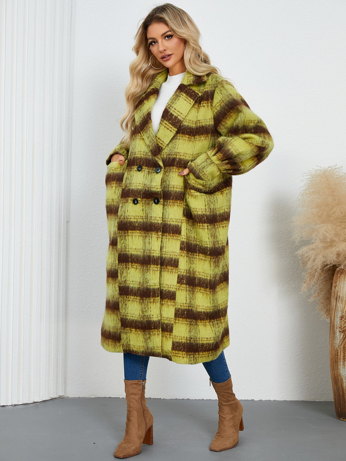 Checked plaid cocoon coat in lime with brown stripes, double-breasted, oversized fit, and pockets.
