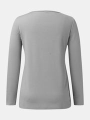 Gray ribbed henley scoop neck top with long sleeves.