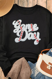 Black sweatshirt with white baseball script appliqué and red stitching detail.