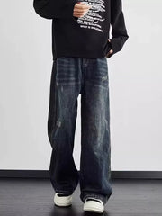 Distressed dark wash wide leg men's jeans with a relaxed fit.