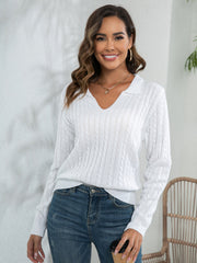 White cable knit polo neck jumper with V-neck and long sleeves.