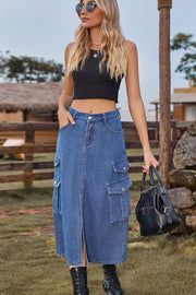 Denim midi skirt in medium blue with cargo pockets and front slit.