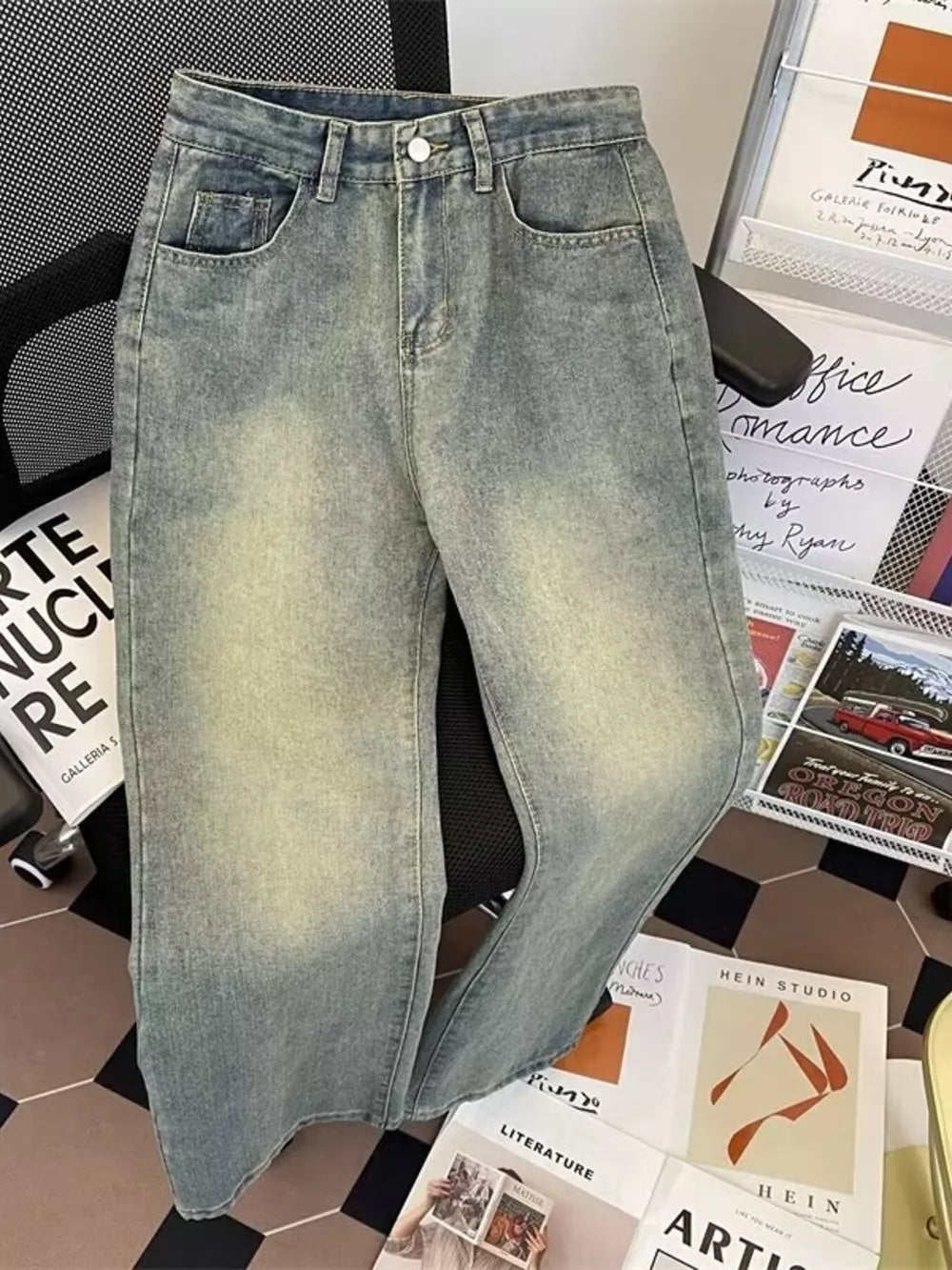 Classic plus size vintage wash jeans in medium blue denim with a relaxed fit.