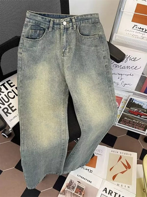 Classic plus size vintage wash jeans in medium blue denim with a relaxed fit.