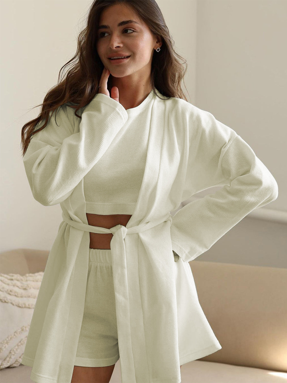 Cream waffle knit robe with tie waist over a matching crop top and shorts.