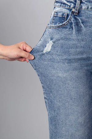 Mid-rise relaxed fit denim jeans with distressed detail and cuffed hem.