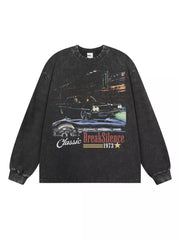 Oversized dark gray long-sleeve t-shirt with a vintage car graphic and text.