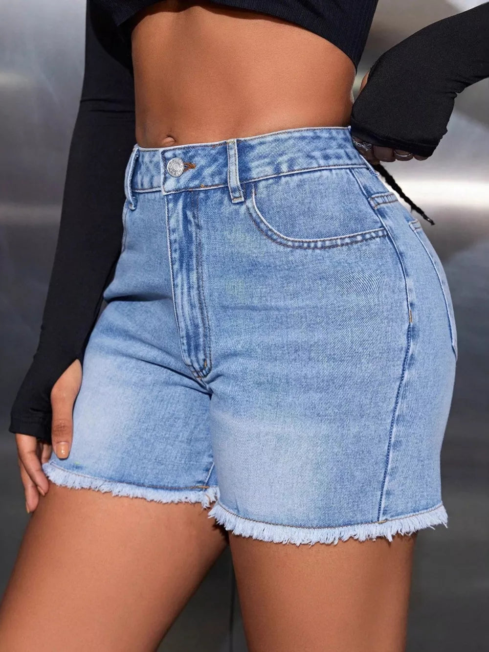 Button-down Denim High-waisted Frayed Hem Denim Shorts in Blue, close-up detail