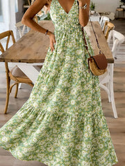 Floral tiered maxi dress with spaghetti straps in Yellow-Green, featuring a v-neck and flowy skirt.
