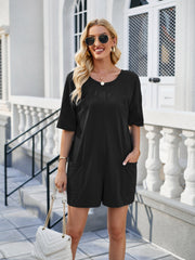 Black relaxed backless tee romper with pockets and short sleeves