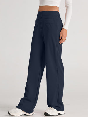 Button-front palazzo trousers in dark navy with two front flap pockets and a wide leg.