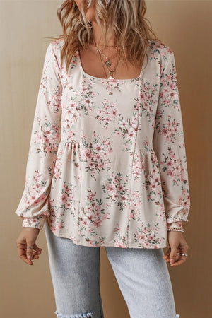 Floral print peplum blouse with square neck and long sleeves.