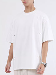White cotton crew neck oversized t-shirt with subtle stitch details on sides