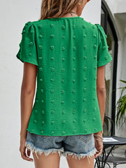 Mid Green textured puff sleeve dot blouse with V-neck.