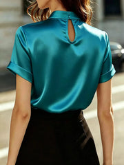 Deep Teal satin maternity shirt with mock neck, cuffed sleeves, and back cutout detail.