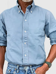 Light Blue Oxford button-down shirt with relaxed fit and button collar.