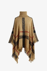Beige plaid turtleneck cape with fringe detail and acrylic texture.