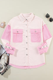 Colorblock corduroy shacket in blush pink with raw edges and buttoned chest pockets.